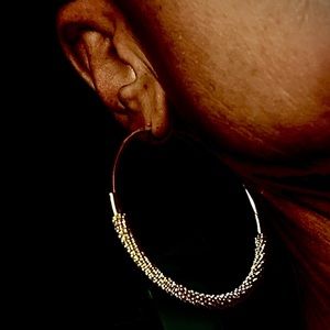 NWOT: Beautiful 2” hoops with .925 silver wire wrap.